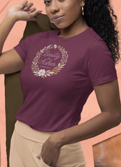 Spiritual fashion tee for women, “Beauty for Ashes” design with soft floral accents.