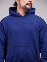 Person wearing “Under His Protection” hoodie by MyCreed with scripture design on front.