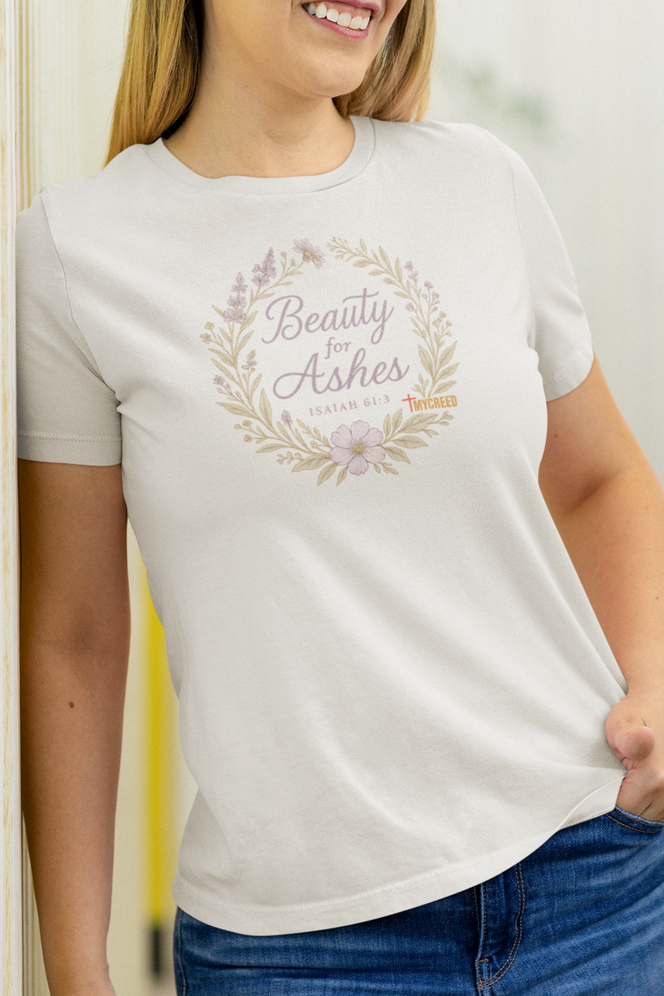 Faith-based women’s tee featuring scripture “Beauty for Ashes” in elegant pastel tones.