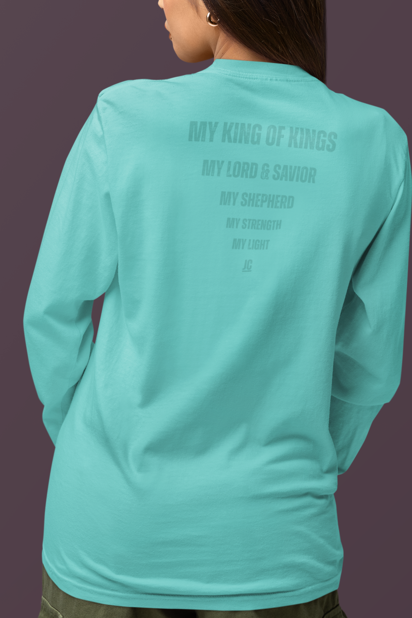 Premium Comfort Colors long sleeve with subtle faith-based back print design.