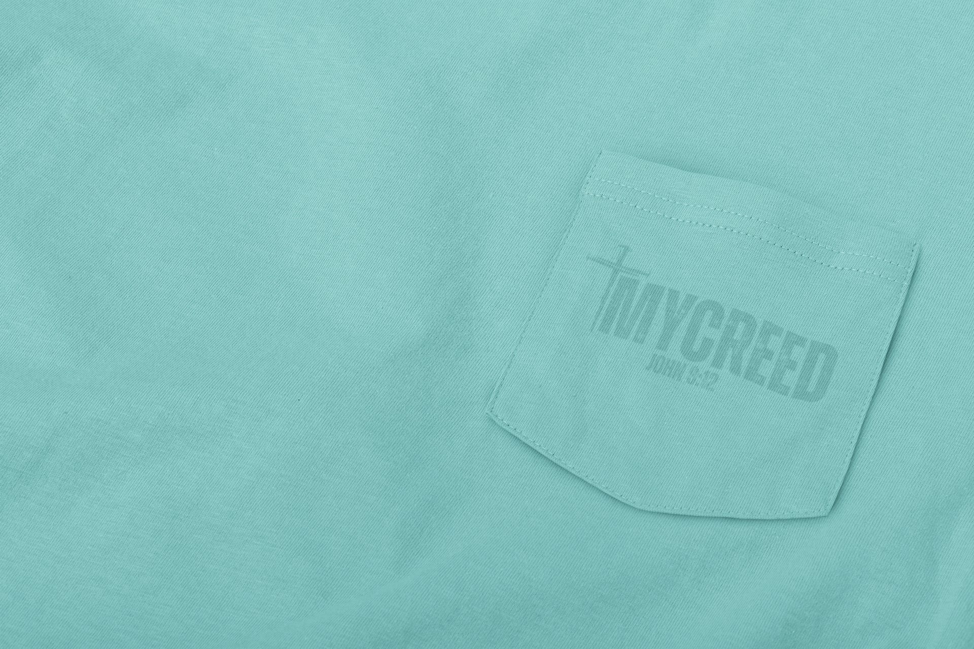 Premium Comfort Colors long sleeve with subtle faith-based back print design.