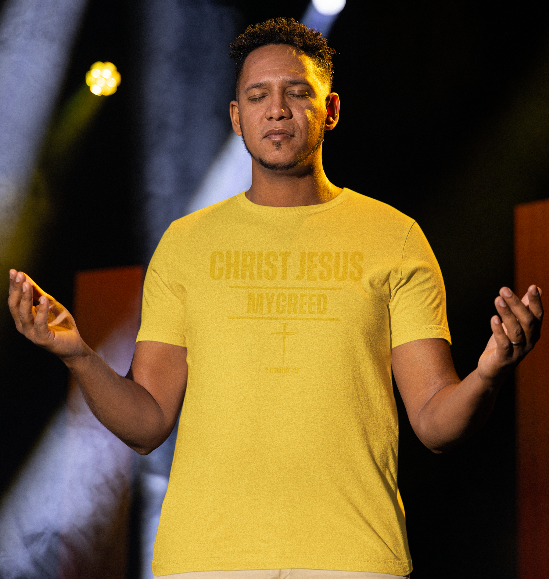 Subtle MyCreed apparel t-shirt with cross graphic and scripture verse, symbolizing quiet conviction.