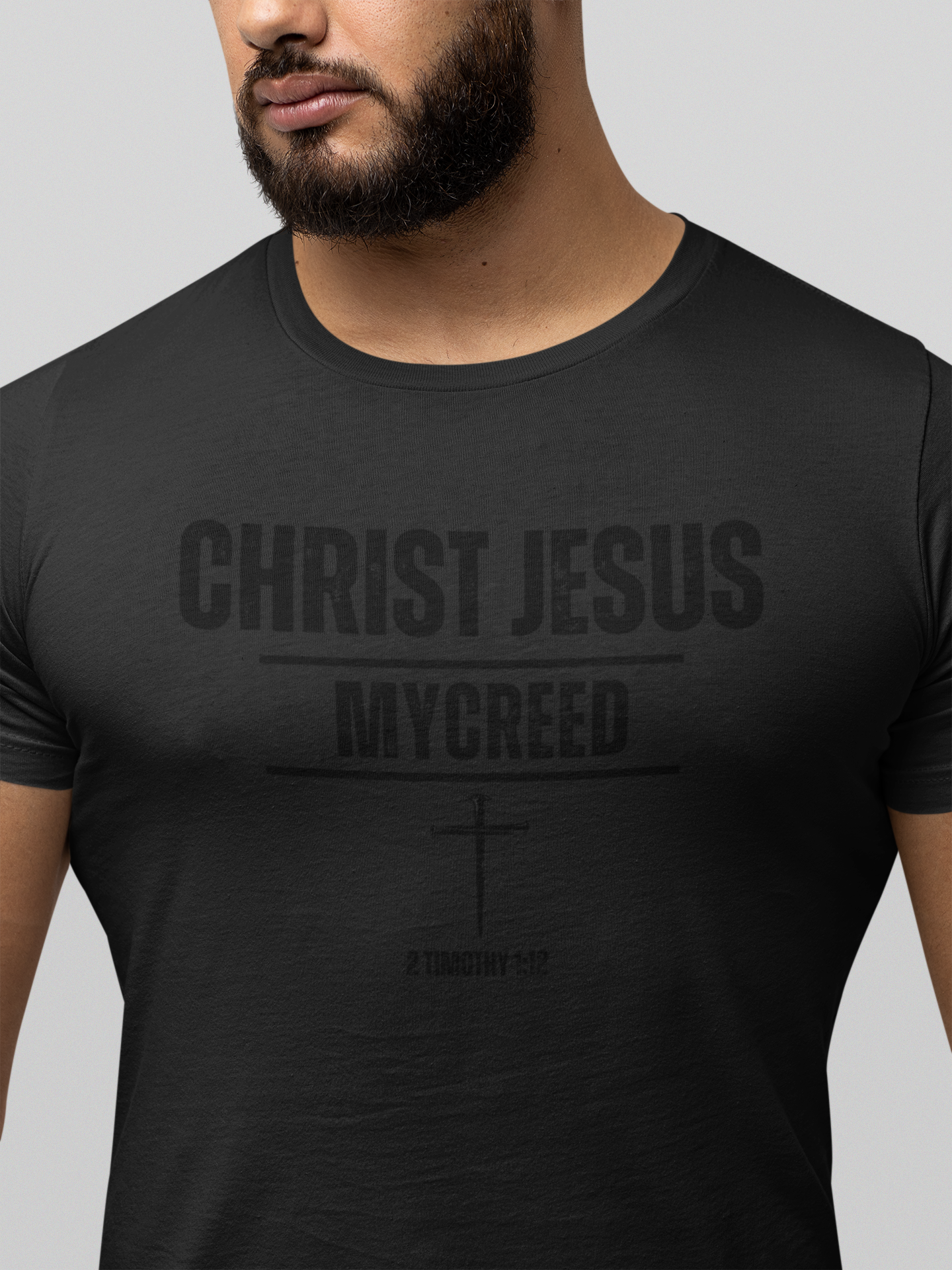 Unisex Christian faith tee — minimalist design featuring Christ Jesus and scripture for modern believers.