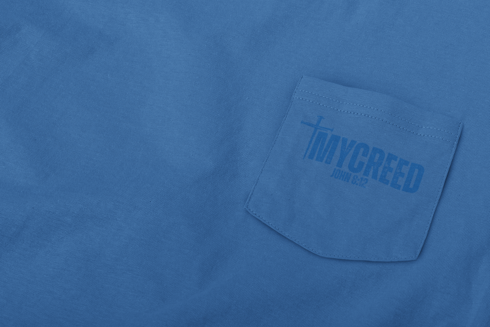 Premium Comfort Colors long sleeve with subtle faith-based back print design.