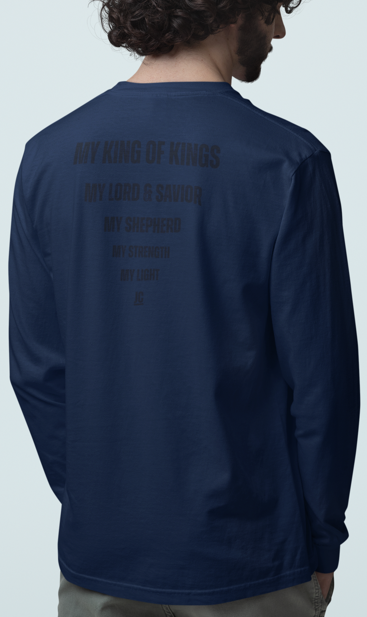 Back view of The JC Creed Tee with stacked titles tapering down to Jesus Christ.