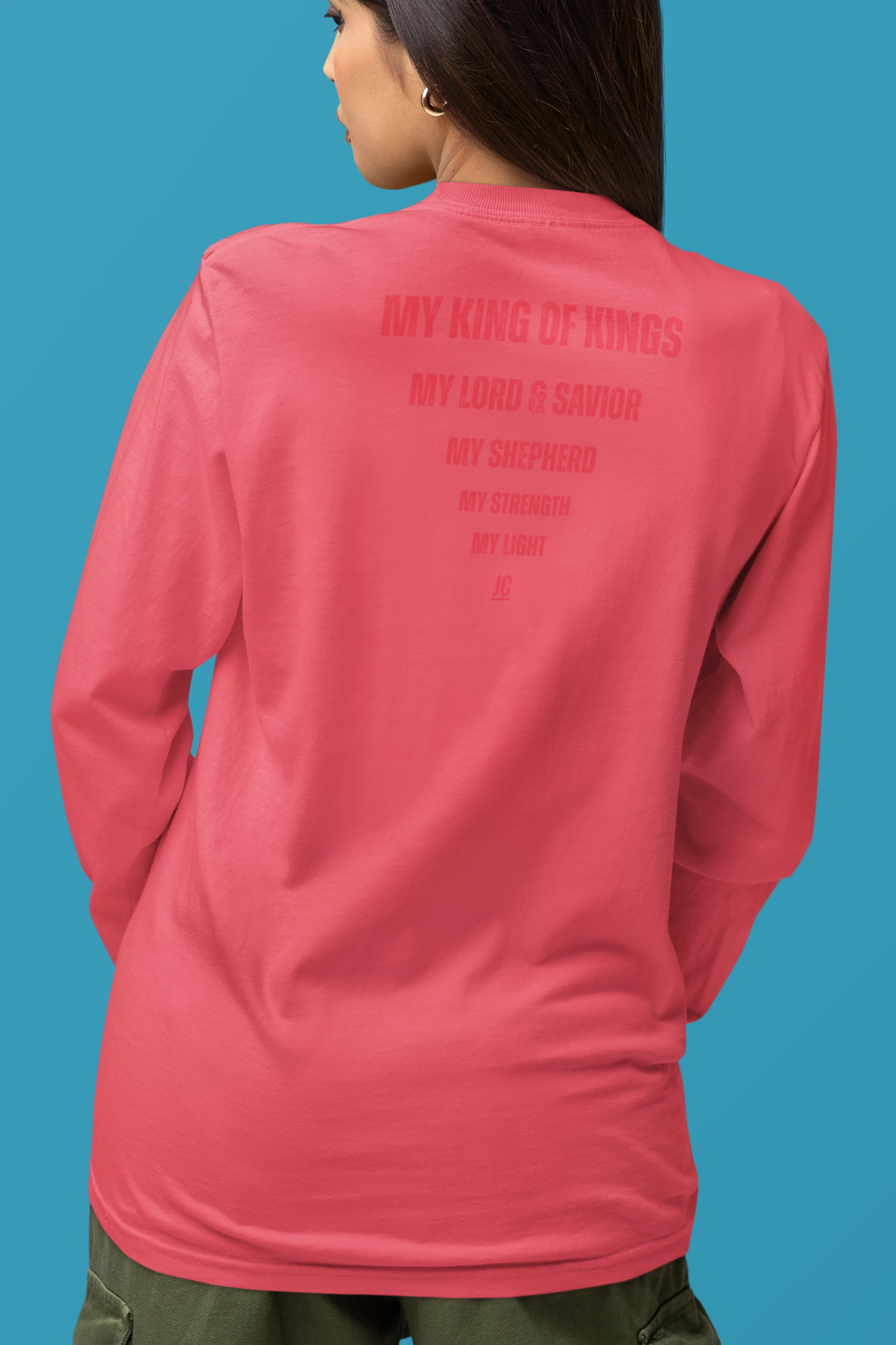Premium Comfort Colors long sleeve with subtle faith-based back print design.