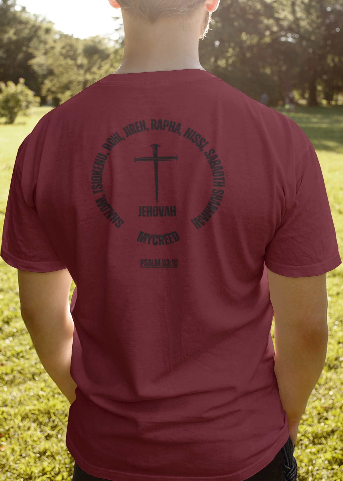 Jehovah Names tee with nail-shaped cross, bold MYCREED logo, and Psalm 83:18 scripture on BELLA+CANVAS 3001 shirt.