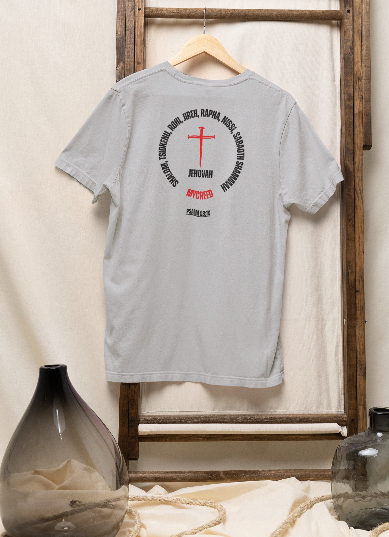 Back print Christian t-shirt featuring blood-red cross and covenant names of Jehovah with Psalm 83:18 scripture by MyCreed.