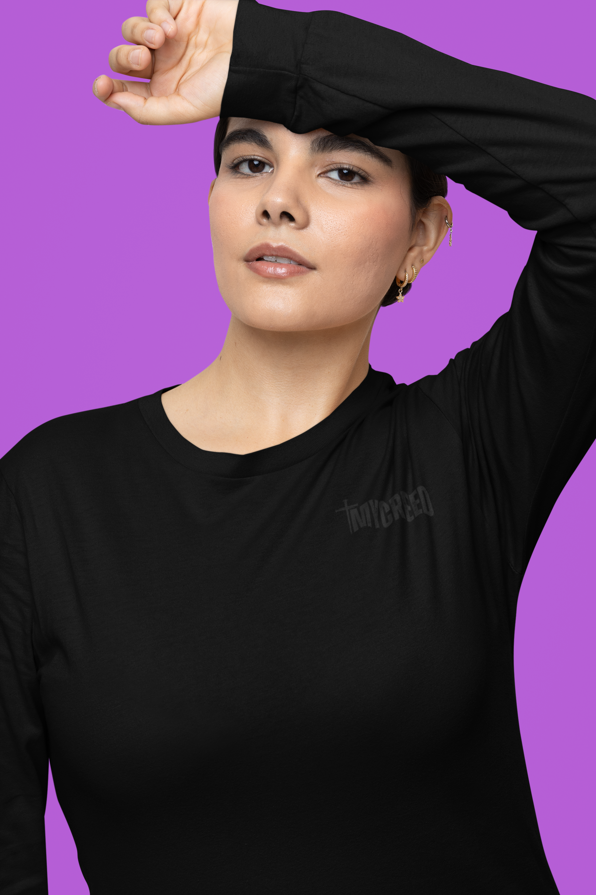Front view of Bella+Canvas women’s long sleeve tee featuring “Names of God” Christian design, MyCreed apparel.
