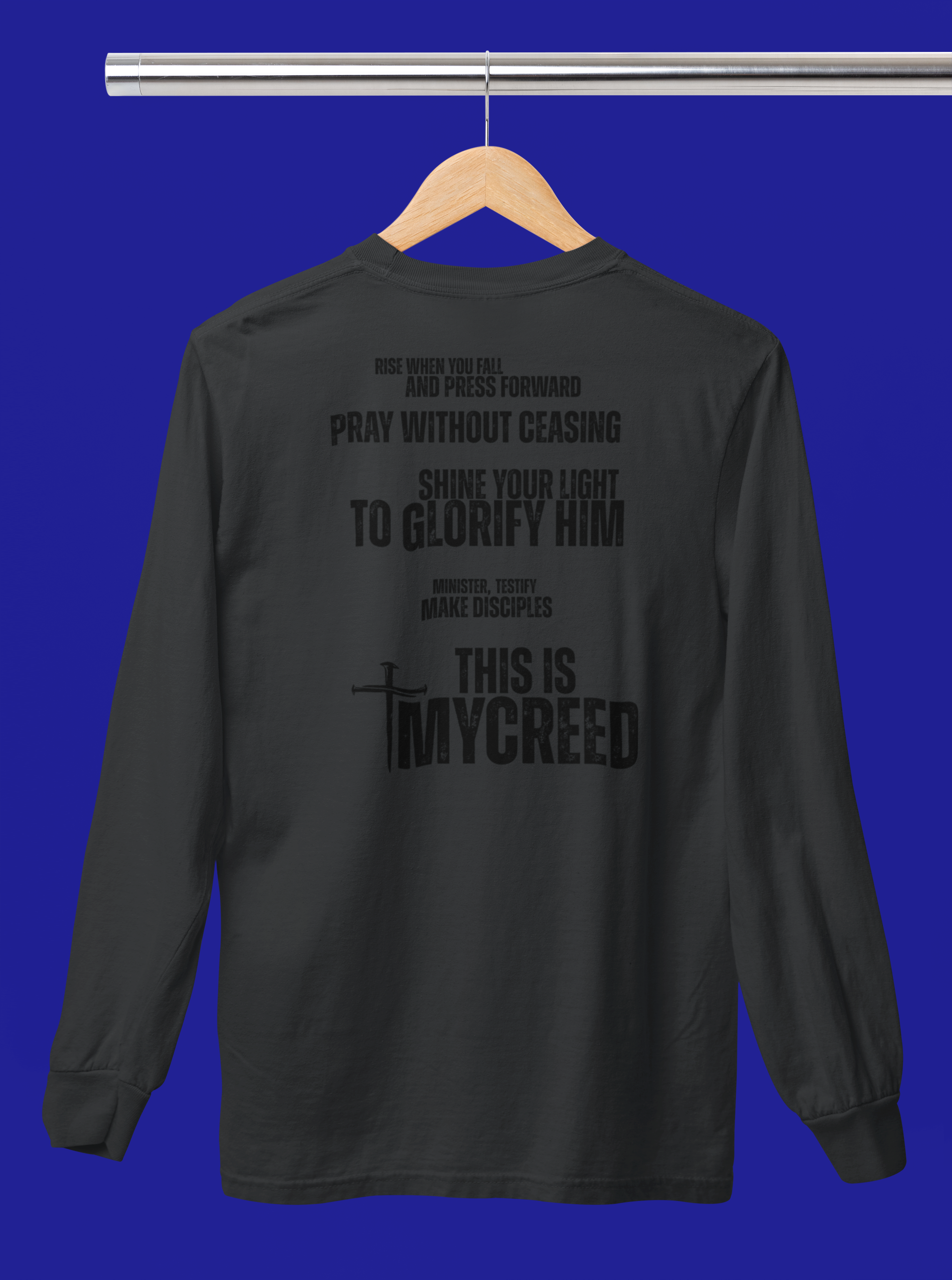 Unisex Christian long sleeve shirt with The Declaration design — rise, pray, shine, glorify, and make disciples.
