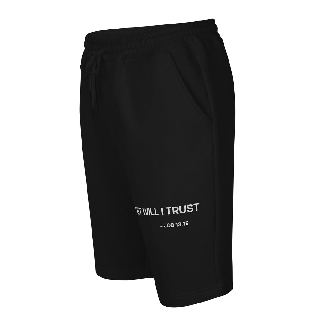 Black fleece shorts angled front side view showing minimalist scripture thigh print by MyCreed™