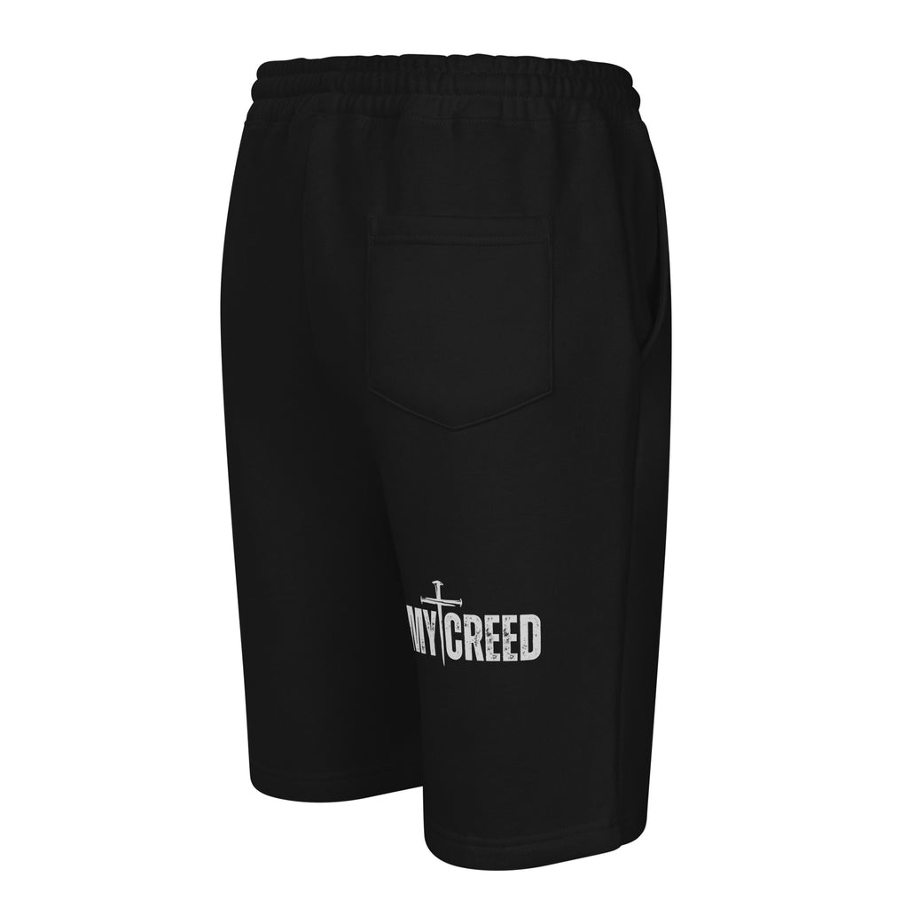Black fleece shorts rear three-quarter angle highlighting MYCREED branding by MyCreed™