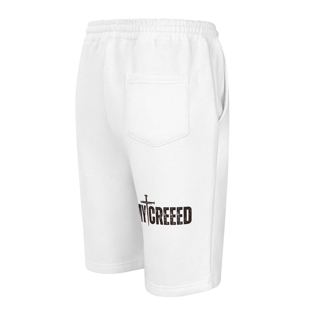 White fleece shorts rear three-quarter view highlighting MYCREED back leg branding by MyCreed™