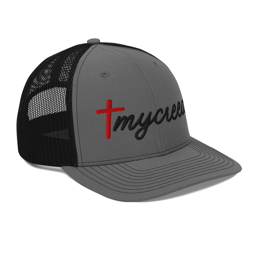 Side angle of charcoal MyCreed™ richardson snapback hat with contrast stitching and snapback closure by MyCreed™
