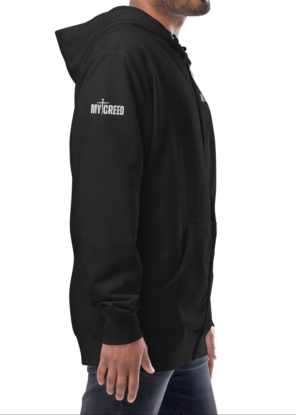 Black zip-up hoodie worn by male model, right side profile showing clean minimalist Christian streetwear fit by MyCreed™