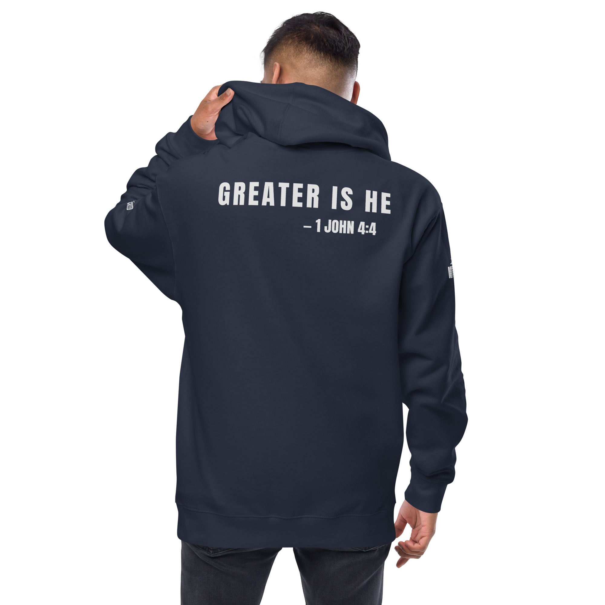 Navy zip-up hoodie on model, back view showing “GREATER IS HE — 1 JOHN 4:4” design by MyCreed™