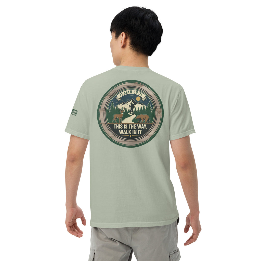 Lifestyle back view of man wearing sage green Comfort Colors tee showing full circular Isaiah 30:21 back artwork, by MyCreed™