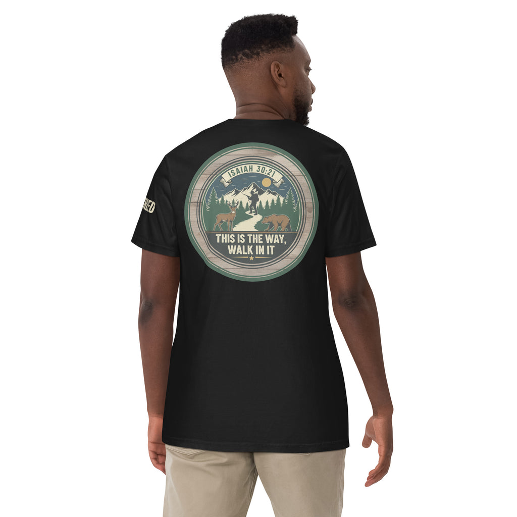 Lifestyle back view of man wearing black Comfort Colors tee with full scripture circle design visible, by MyCreed™