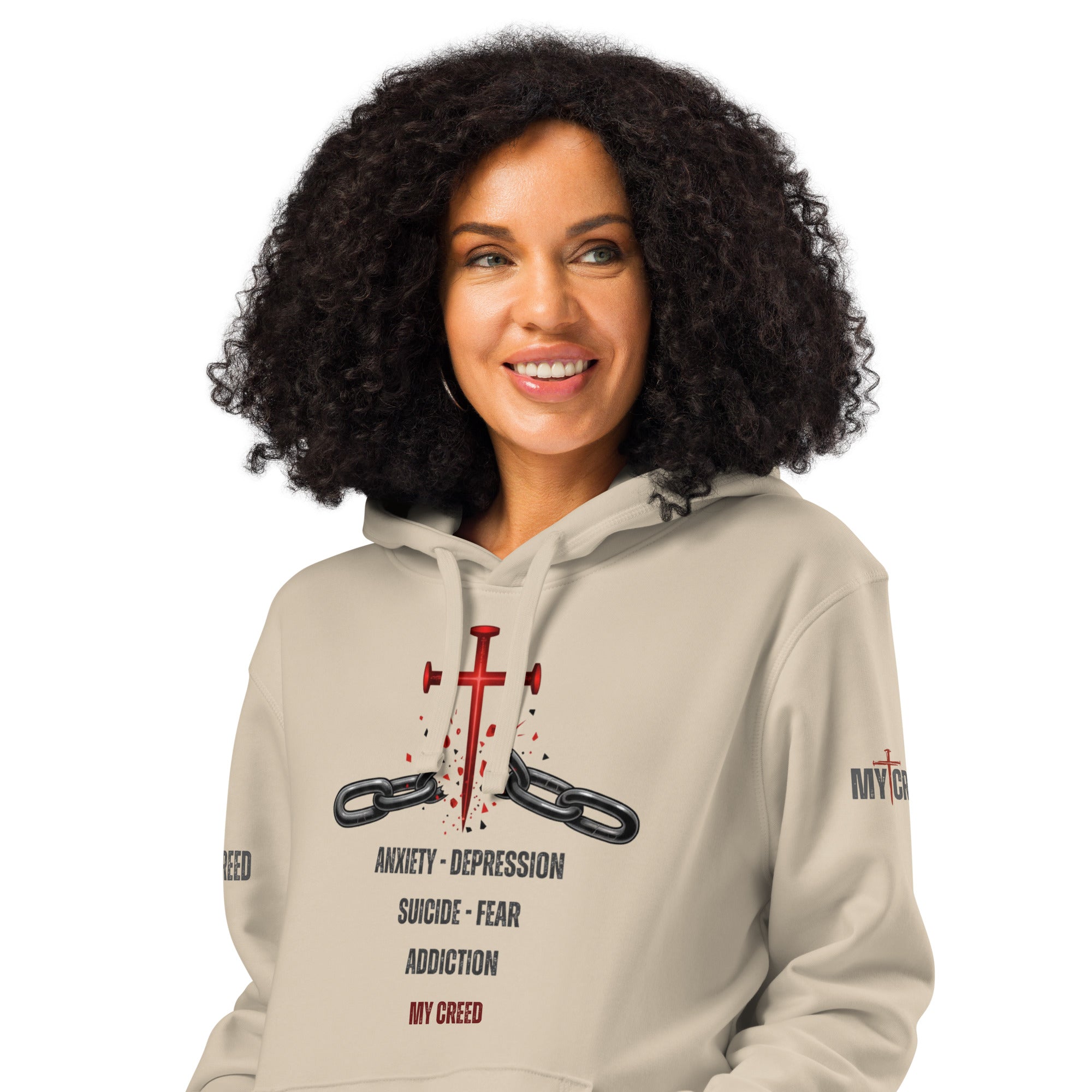 Female model wearing dust ChainBreaker hoodie with cross-and-chains front graphic and red accents by MyCreed™