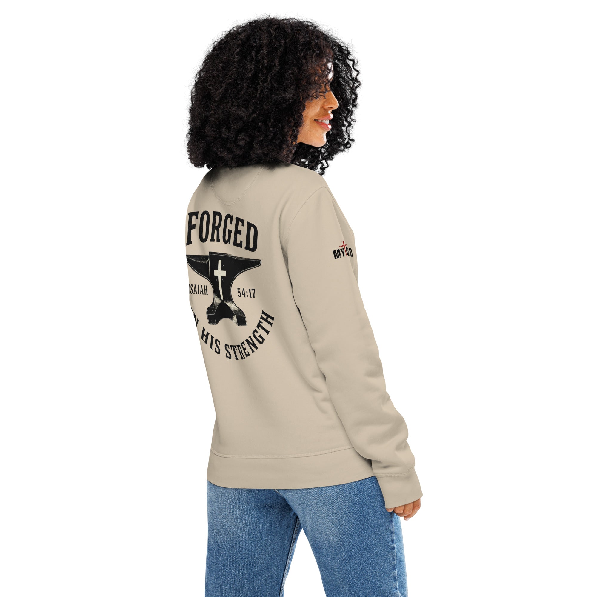 Model wearing natural color Forged in His Strength sweatshirt showing back design by MyCreed™