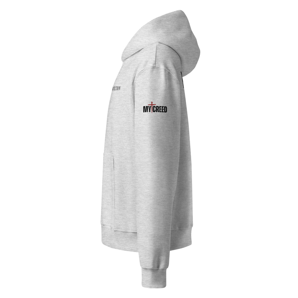 Side profile of athletic heather hoodie showing relaxed unisex fit and hood shape, by MyCreed™