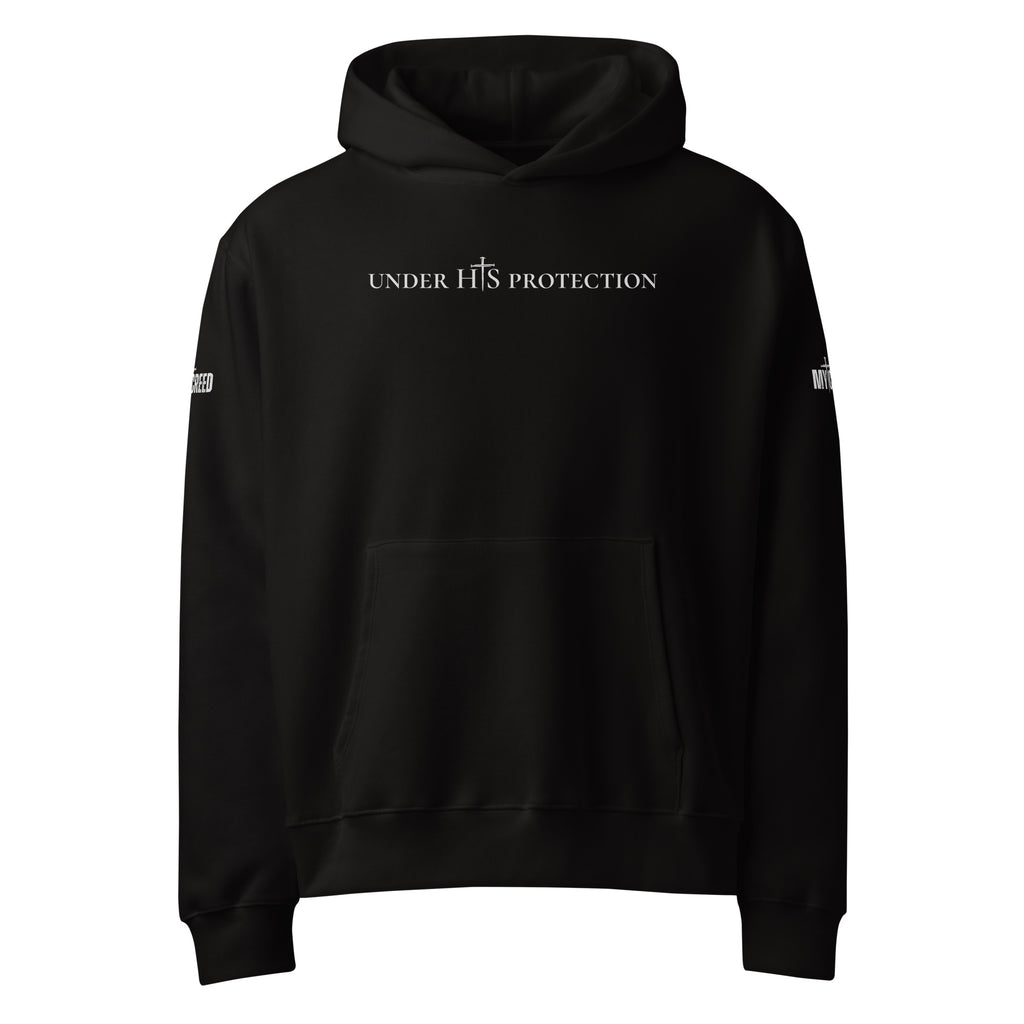 Black unisex hoodie front view with subtle “Under His Protection” text design on chest, by MyCreed™