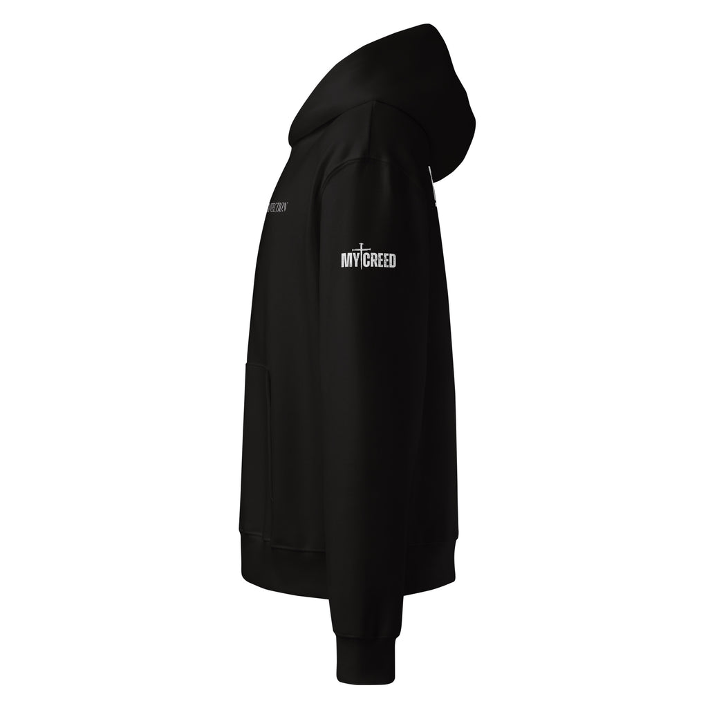 Side view of black unisex hoodie highlighting clean silhouette and sleeve length, by MyCreed™