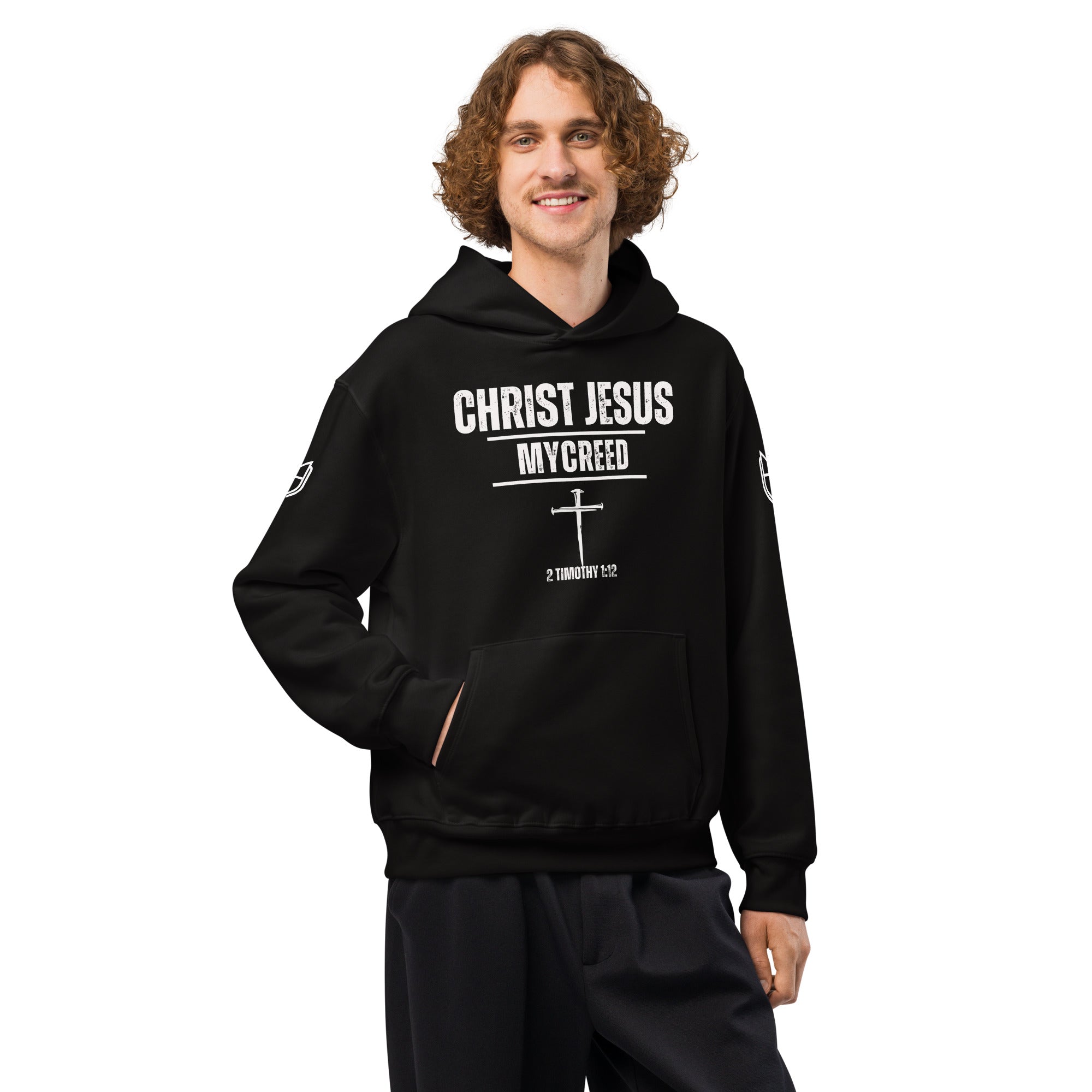 Black Bella + Canvas 4719 hoodie worn by male model with Christ Jesus | My Creed design, by MyCreed™