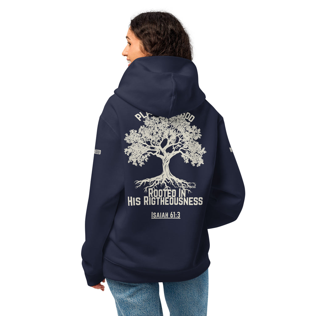 Model wearing navy hoodie, back angled view highlighting large Planted in God back print by MyCreed™