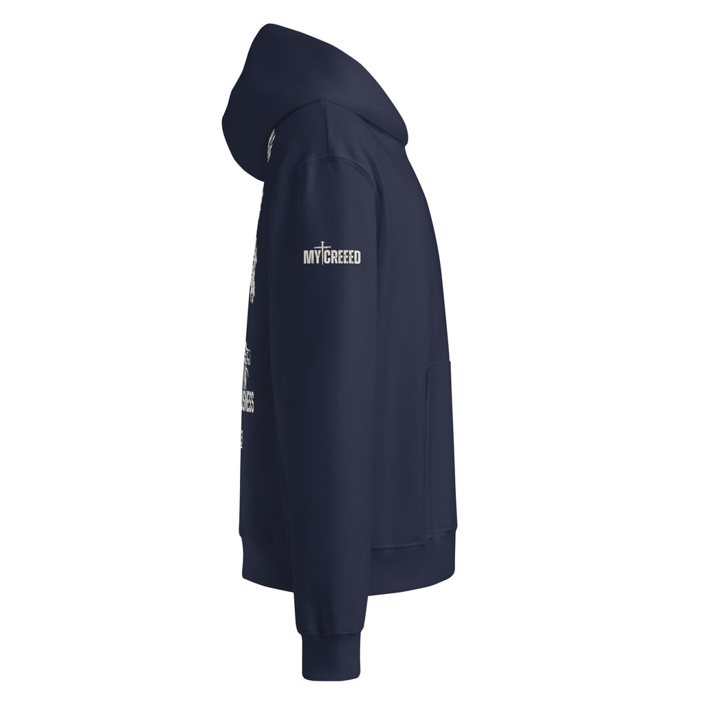 Navy pullover hoodie left side profile showing hood drape and sleeve print by MyCreed™