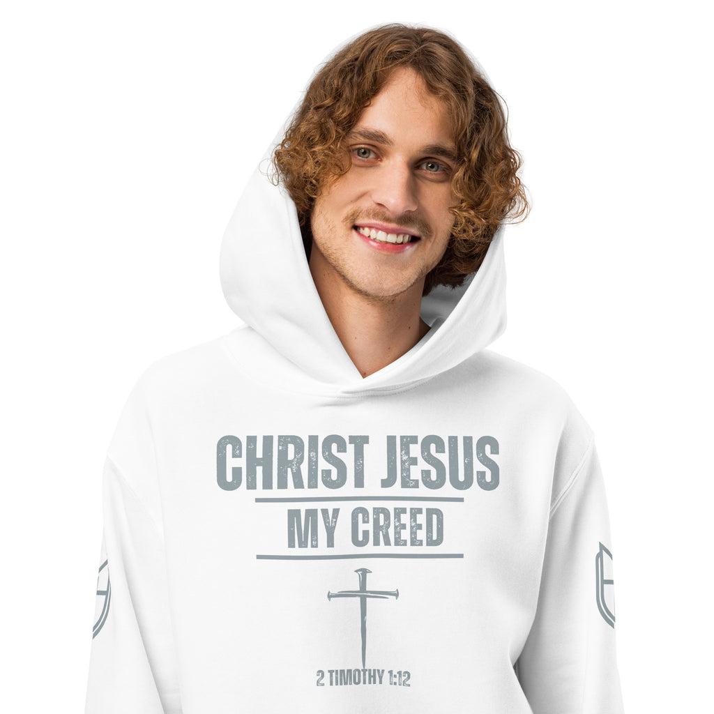 White Bella + Canvas 4719 hoodie worn by model with Christ Jesus | My Creed design visible, by MyCreed™