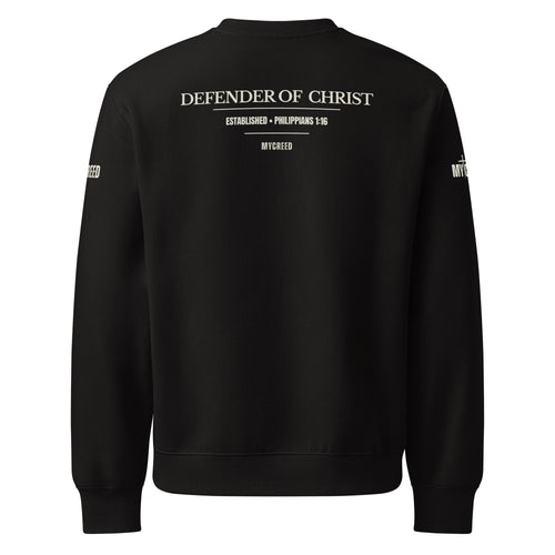 Black crewneck sweatshirt back view displaying the Defender of Christ design with Philippians 1:16 in parchment tone for high contrast on dark fabric, by MyCreed™