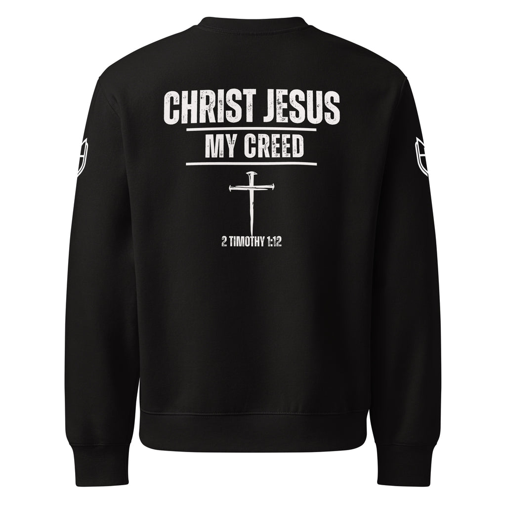 Black Bella+Canvas 4711 oversized sweatshirt featuring the Christ Jesus | My Creed design with cross and 2 Timothy 1:12 on back by MyCreed™