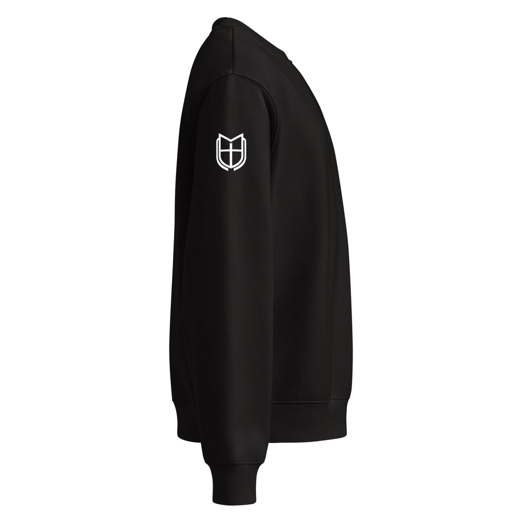 Left side view of black Bella+Canvas 4711 oversized sweatshirt highlighting relaxed unisex drape, by MyCreed™