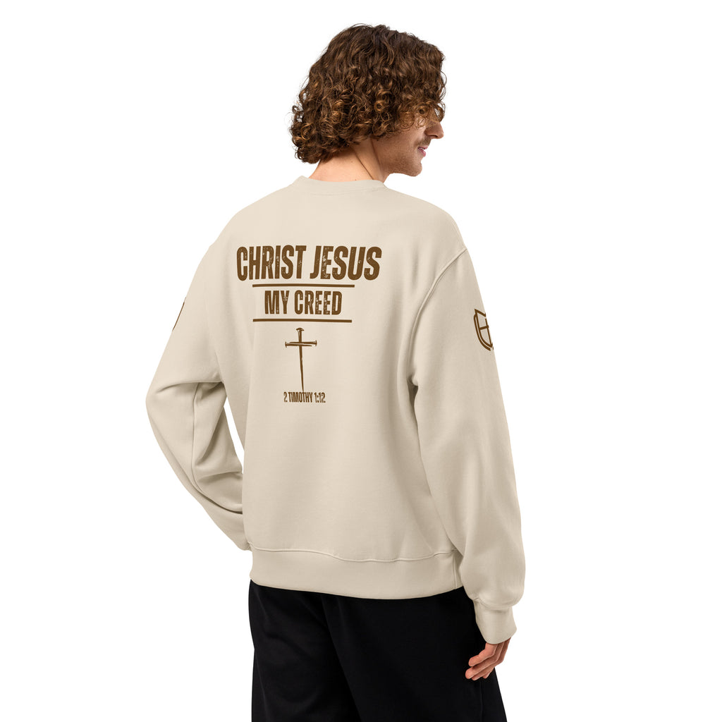 Back view of natural color  Bella+Canvas 4711 oversized sweatshirt worn by model displaying Christ Jesus | My Creed message, by MyCreed™