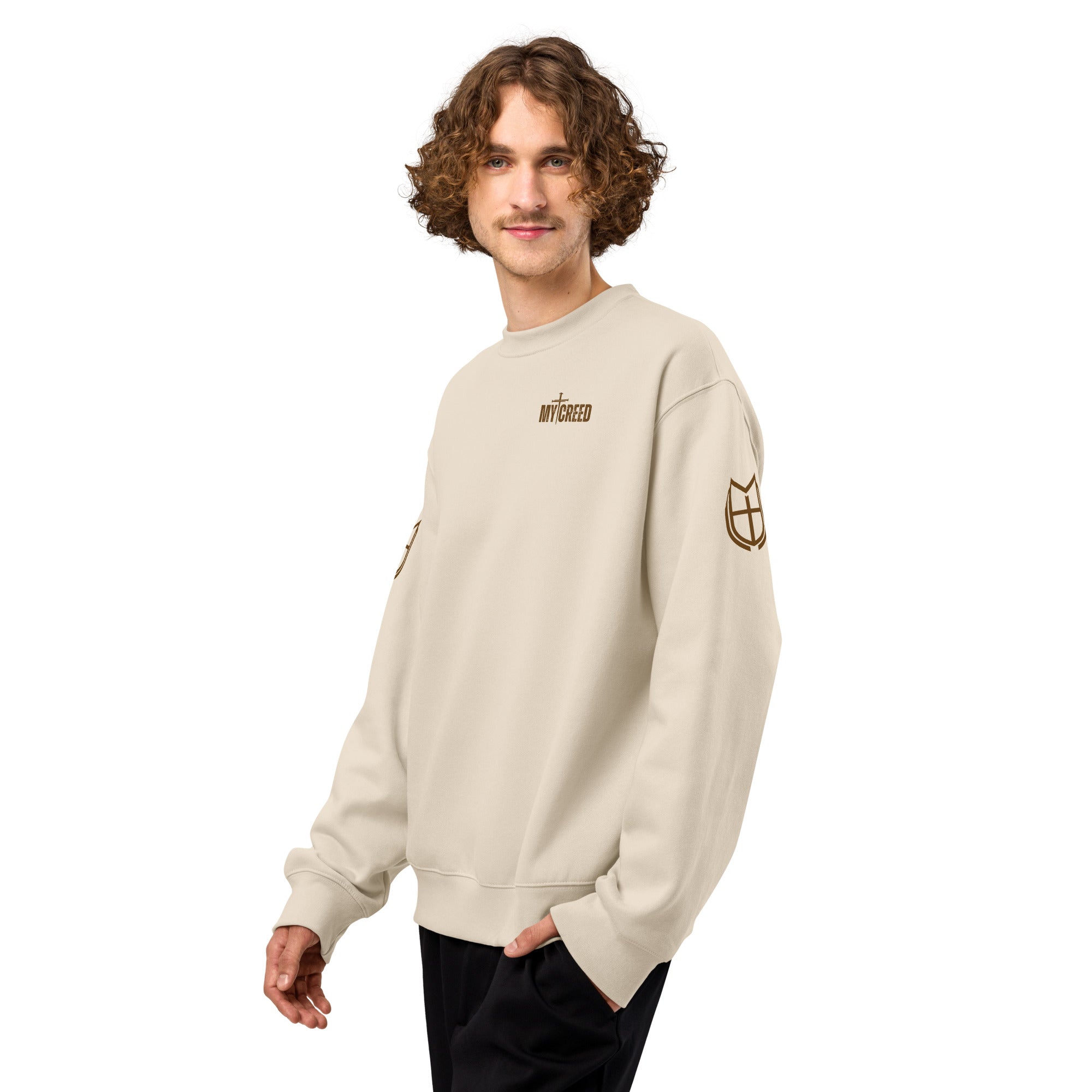 Dust Bella+Canvas crewneck sweatshirt worn by model, front view with elevated neutral streetwear look, by MyCreed™