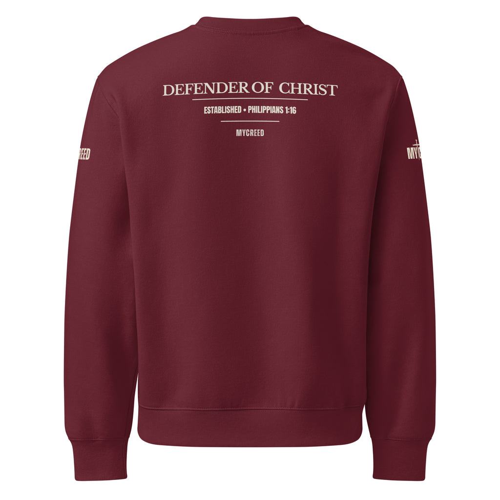 Maroon crewneck sweatshirt back view showcasing the Defender of Christ proclamation design with scripture reference on a deep red garment, by MyCreed™