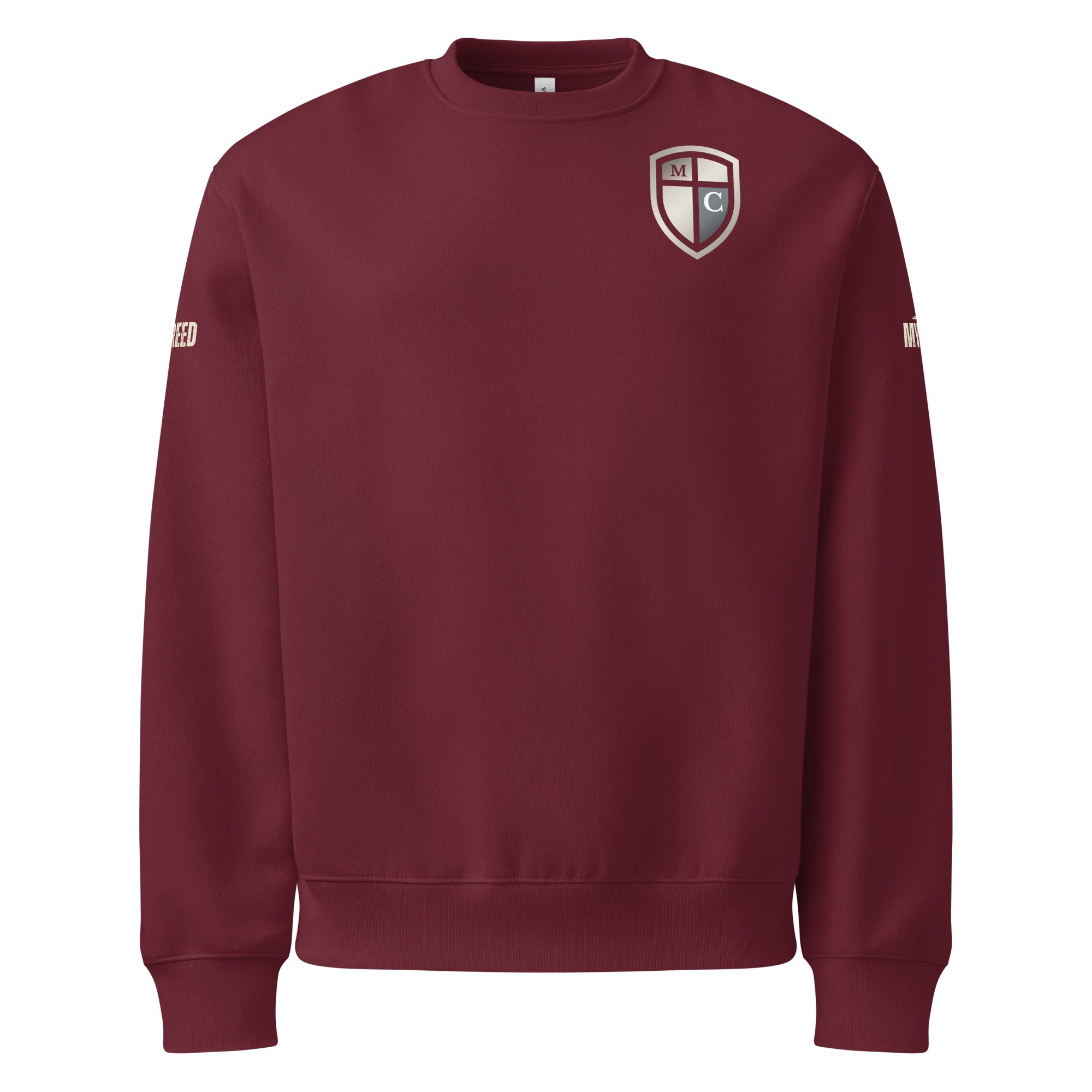 Maroon crewneck sweatshirt front view featuring the Defender of Christ shield emblem on the left chest with rich color depth, by MyCreed™