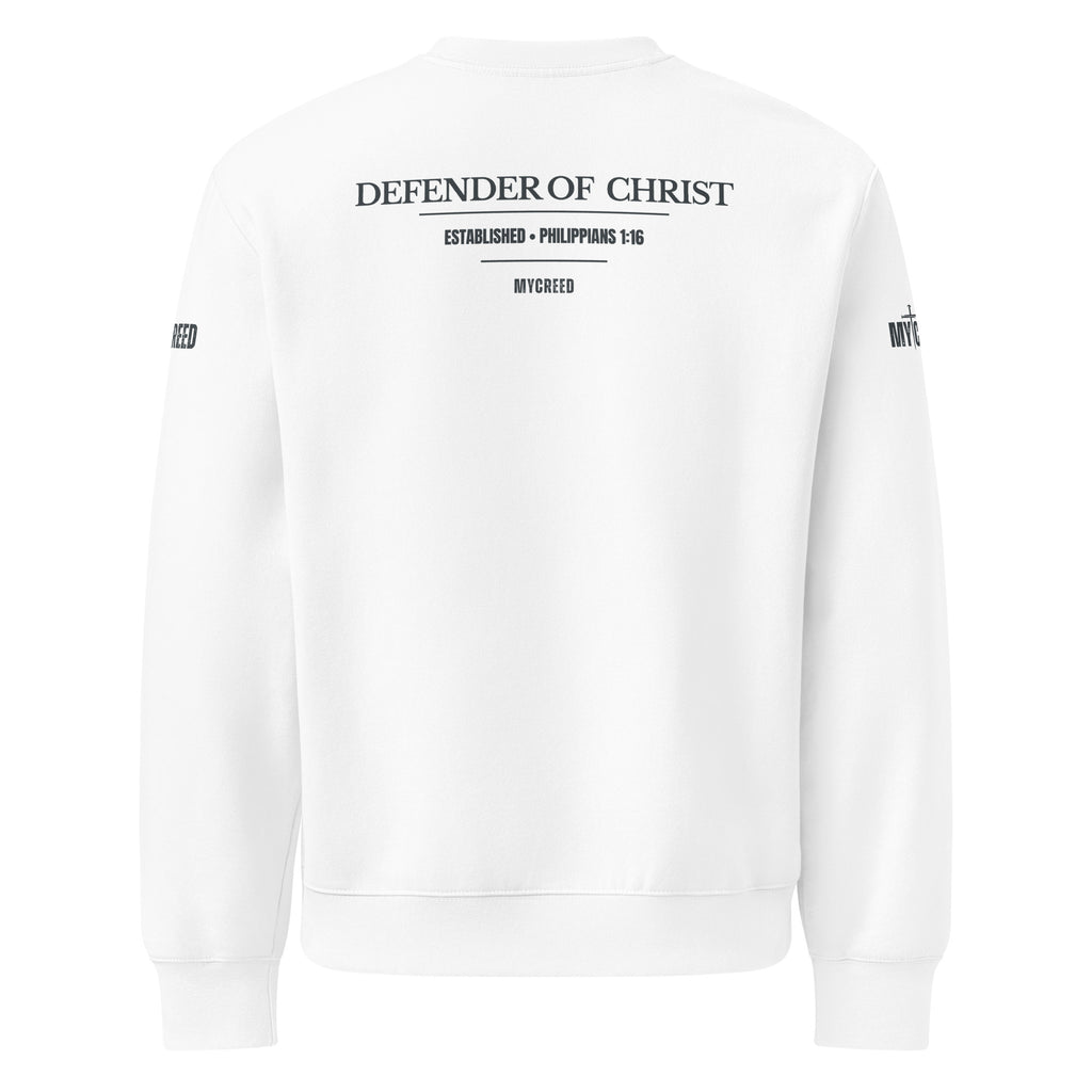 White crewneck sweatshirt back view displaying the Defender of Christ typography with established scripture reference Philippians 1:16, centered and balanced on a light garment, by MyCreed™