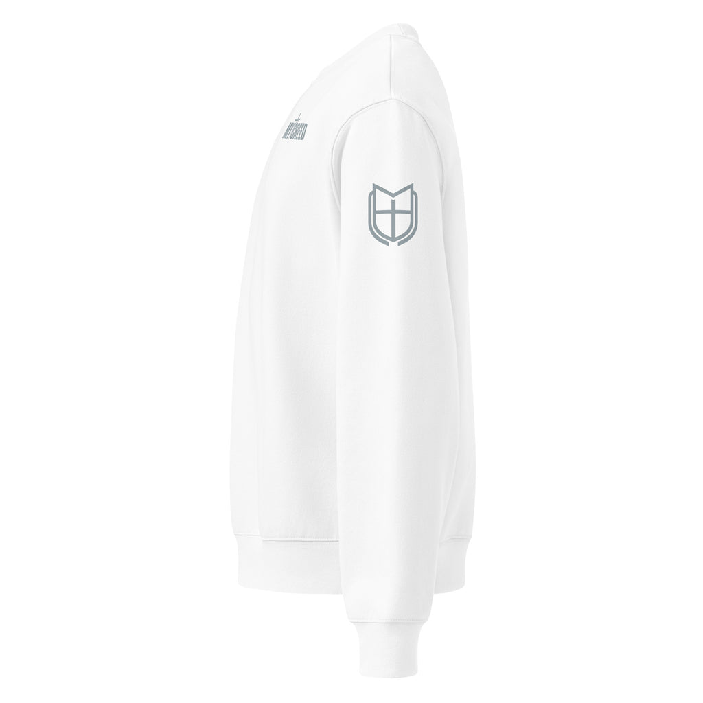 Close side view of white Bella+Canvas 4711 oversized sweatshirt showing sleeve logo detail, by MyCreed™
