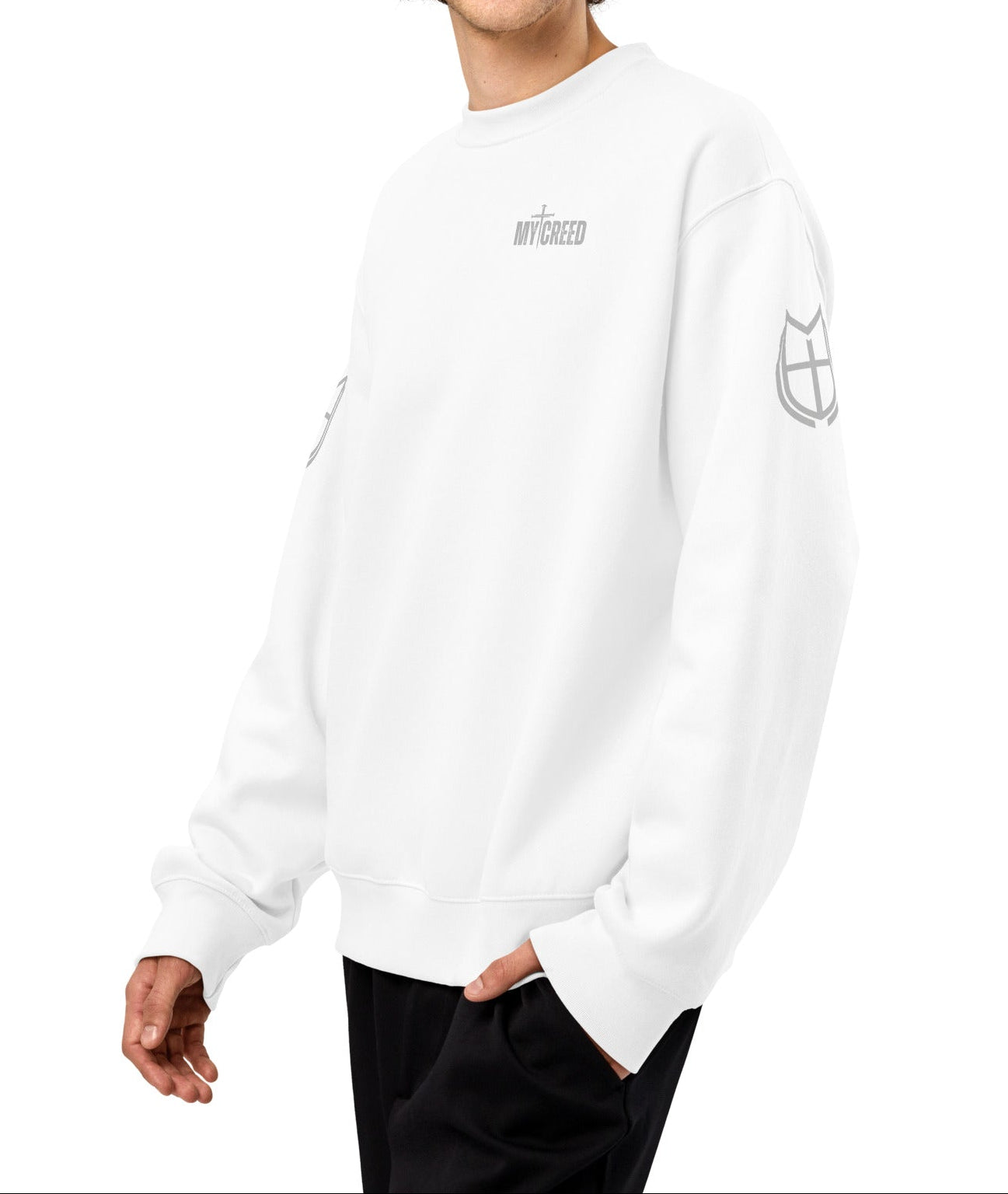 White Bella+Canvas sweatshirt worn by model, back view displaying cross-centered His Cross, My Creed design, by MyCreed™