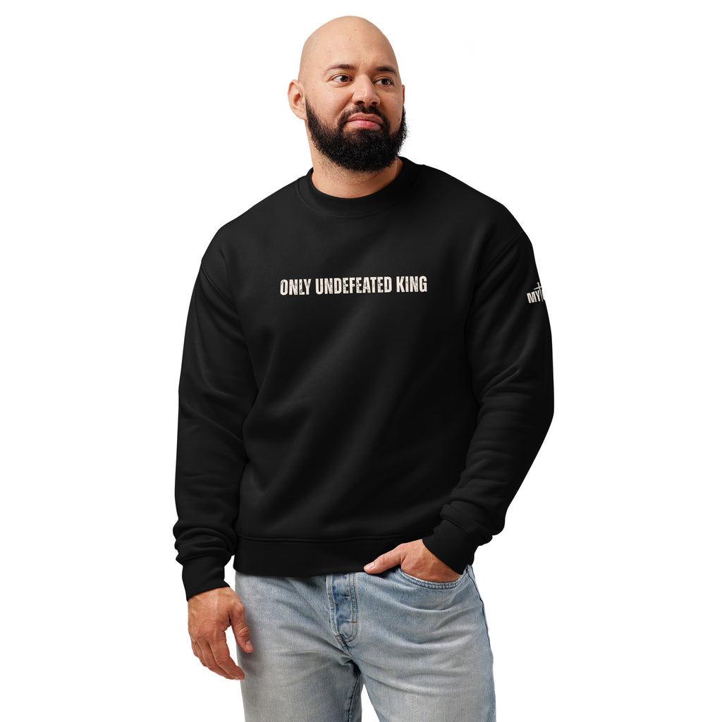 Male model wearing black Only Undefeated King sweatshirt styled for everyday Christian streetwear by MyCreed™