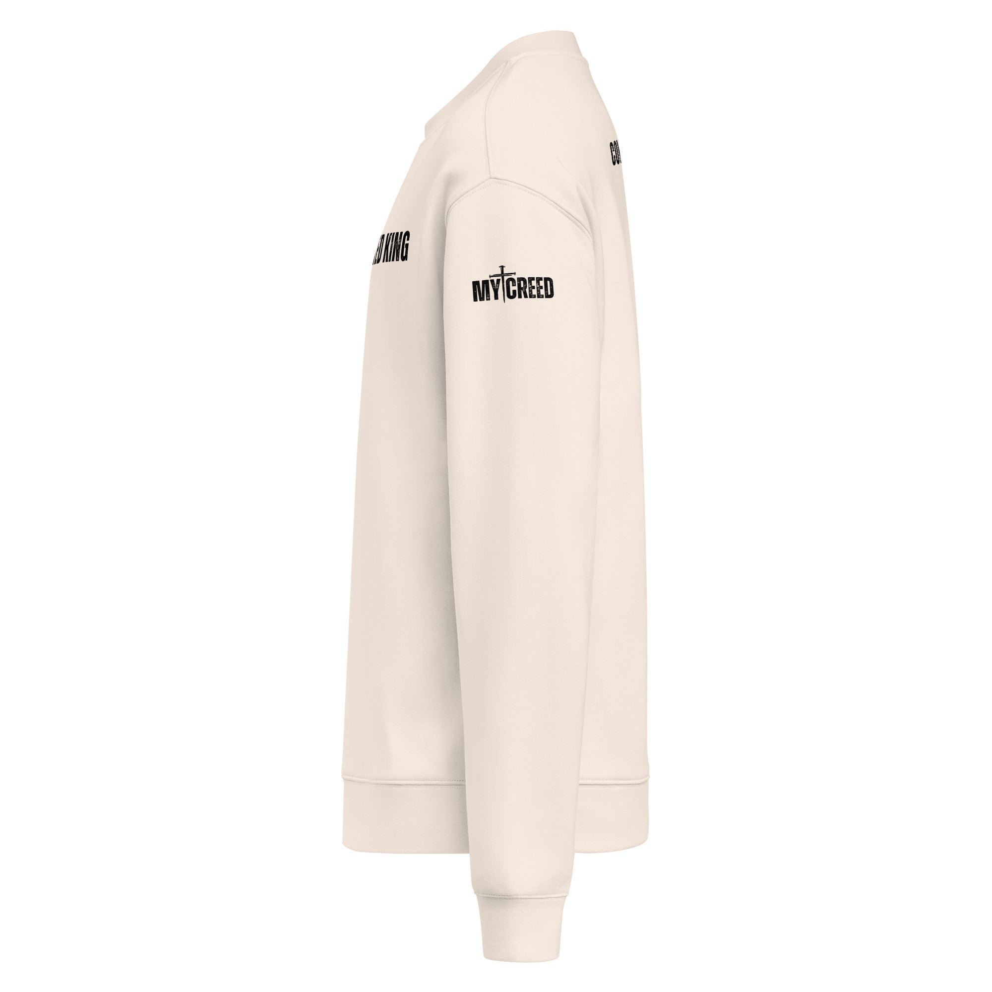 Side angle of bone white faith-driven sweatshirt with Only Undefeated King wording by MyCreed™