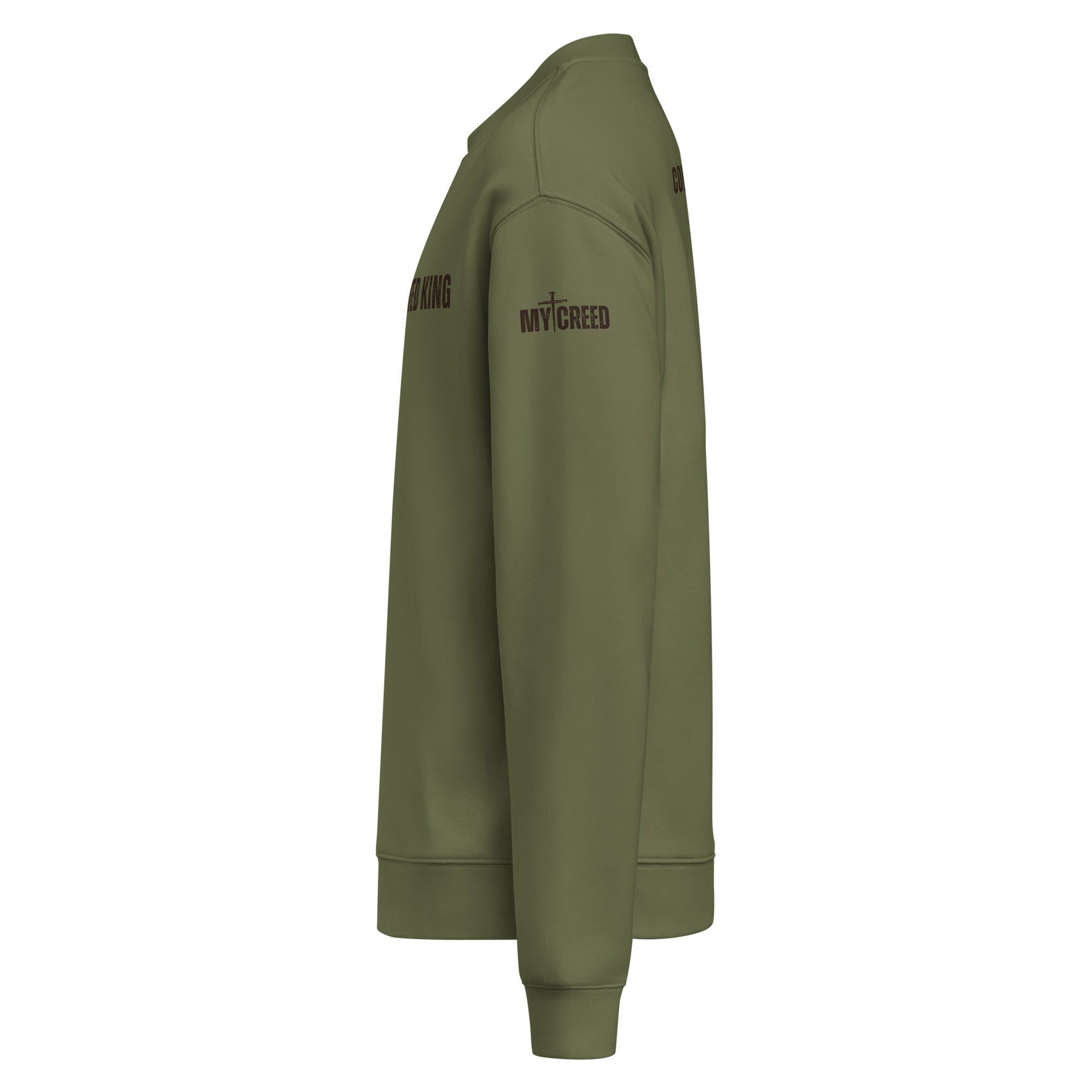 Side angle of cypress green faith-driven sweatshirt with Only Undefeated King wording by MyCreed™