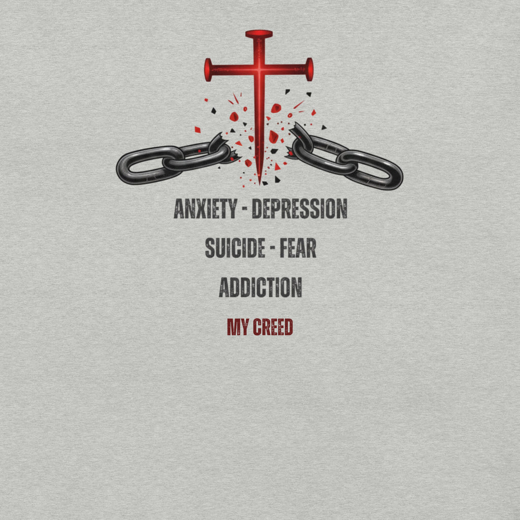 Close-up front view of Athletic Heather ChainBreaker t-shirt with red cross breaking chains and scripture detail by MyCreed™