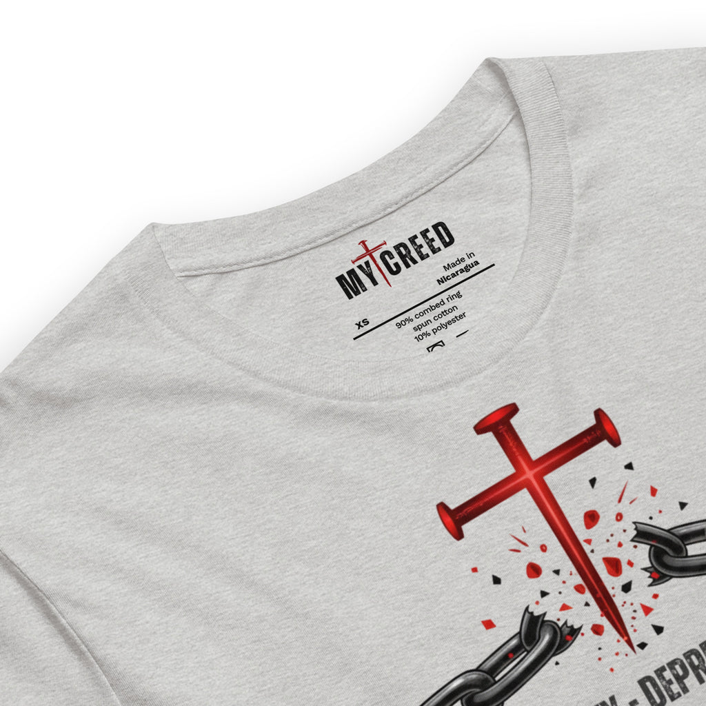 Close-up angled view of Athletic Heather ChainBreaker t-shirt showing cross and chainbreaking graphic detail by MyCreed™