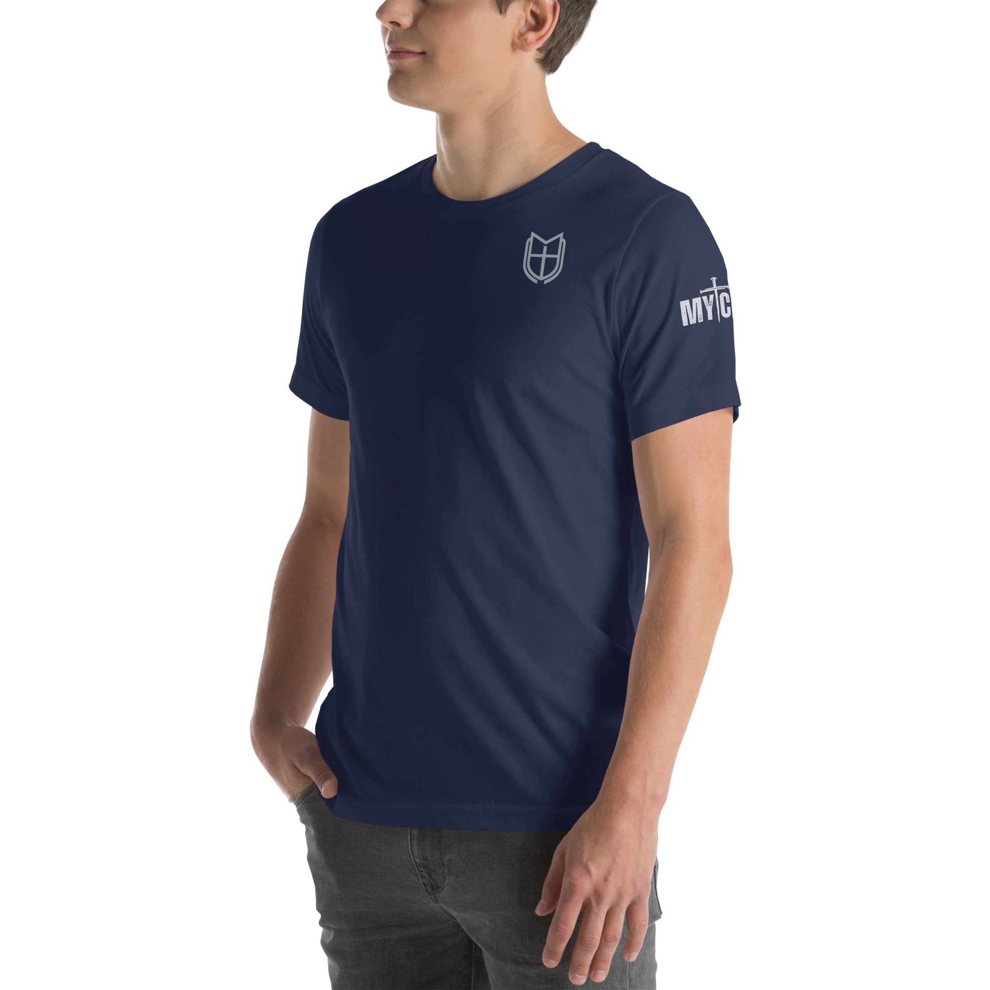 Lifestyle angled front view of navy unisex t-shirt featuring MyCreed shield emblem on left chest and MYCREED wordmark on sleeve, by MyCreed™