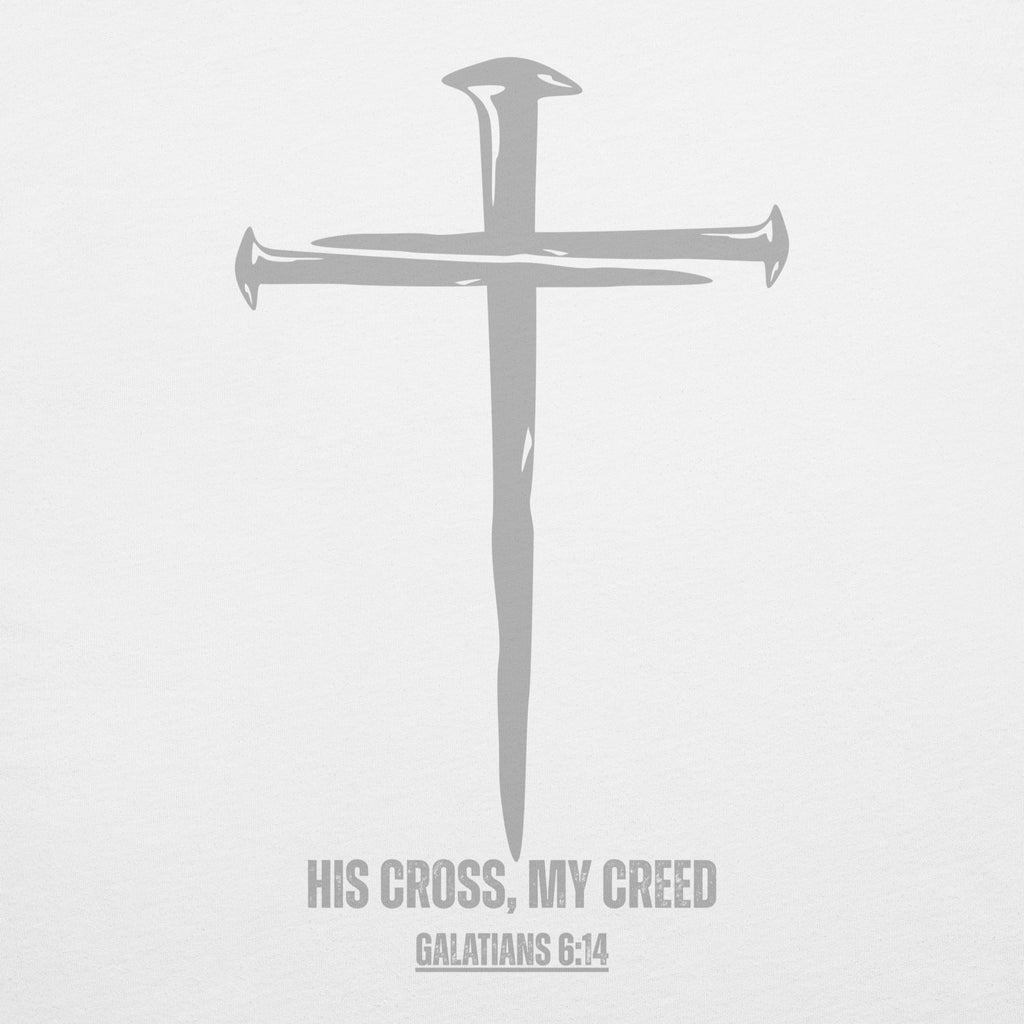 White t-shirt close-up showing soft ink nail cross graphic and scripture text, by MyCreed™